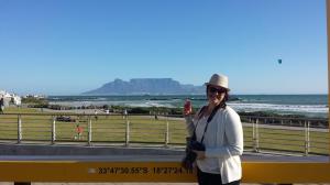 Enjoying an ice cream cone and the view of Table Mountain in Blouberg with a South African friend
