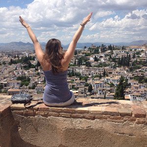 Young woman overlooking Granada, Spain