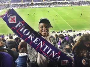 AIFS study abroad student at a Fiorentina soccer game in Florence, Italy