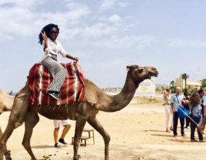 AIFS Abroad student on a camel in Morocco