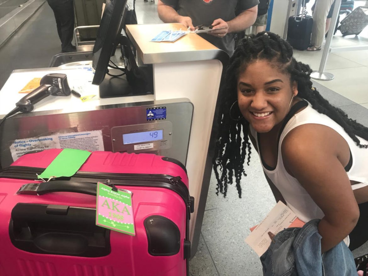 AIFS Abroad student with suitcase at the airport