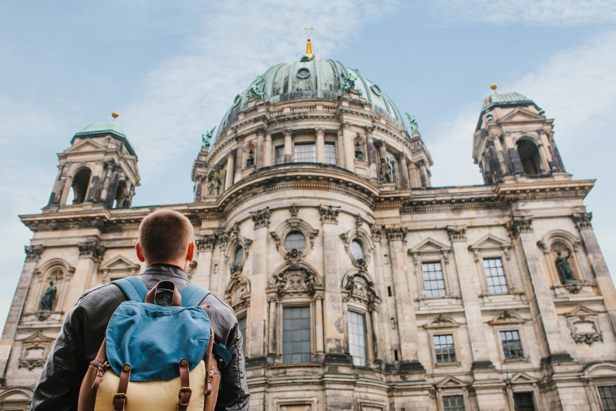 Young man with backpack in Berlin, Germany