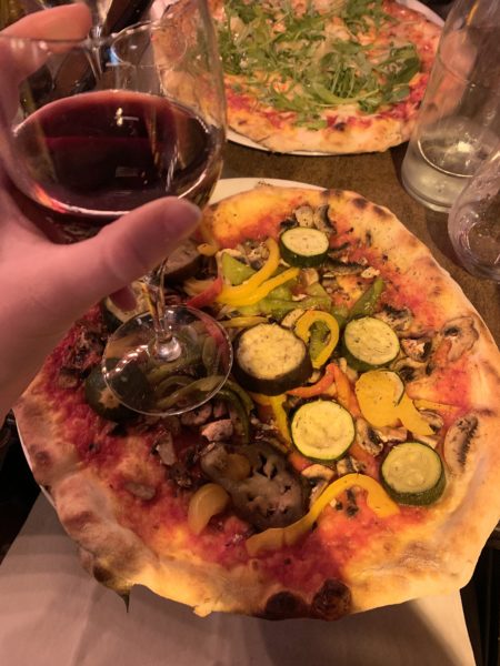 Veggie pizza and wine in France