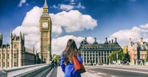 Young woman in London, England near Big Ben and Parliament | AIFS Study Abroad