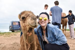 University of Alabama and AIFS alum, Greta, with a camel during an AIFS Study Abroad excursion from Spain to Morocco