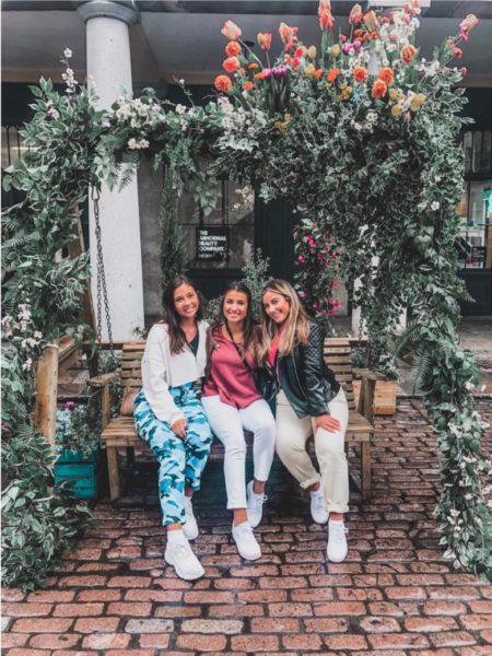 Three college students in Covent Garden Market in London | AIFS Study Abroad