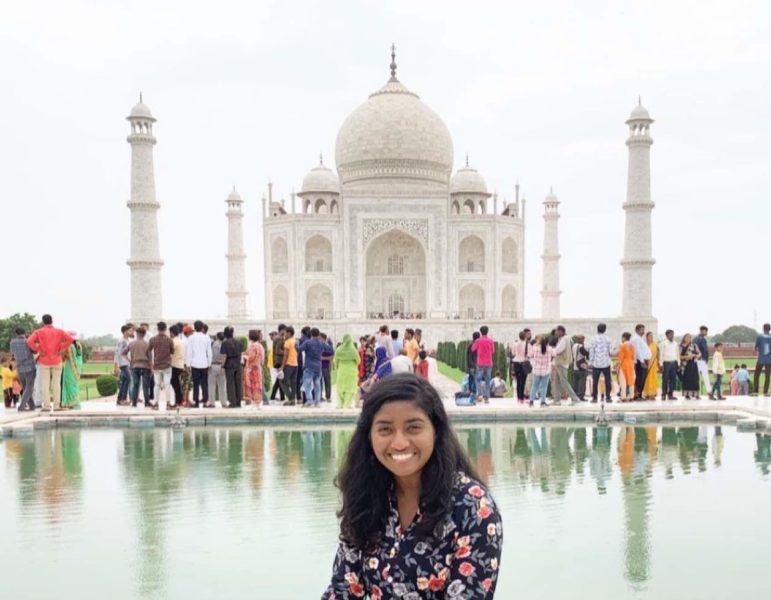 College student at the Taj Mahal in India | AIFS Study Abroad
