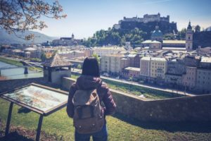 Young person with backpack in Salzburg, Austria