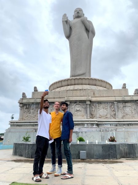 College students at the largest monolith statue of Buddha in the world in Hyderabad, India | AIFS Study Abroad