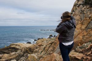 College student taking a photograph while studying abroad | AIFS Study Abroad