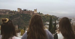 College students in Granada, Spain overlooking La Alhambra | AIFS Study Abroad