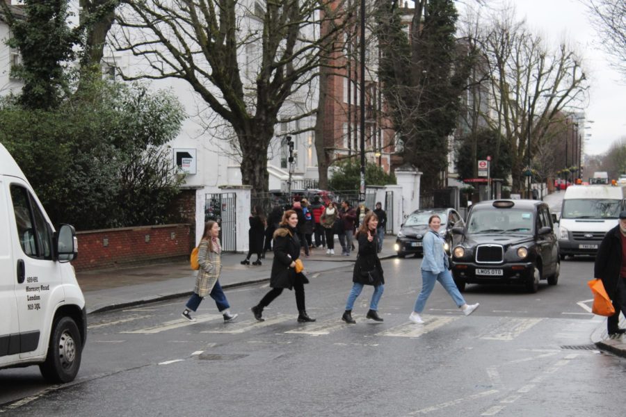 AIFS Abroad students recreating The Beatles album cover at Abbey Road in London, England