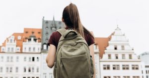 Young woman traveling in Europe with backpack | AIFS Study Abroad