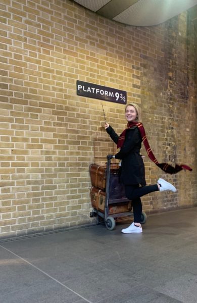 AIFS Study Abroad student visits Platform 9 3/4 at King's Cross Station in London