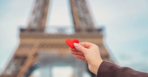Heart in front of the Eiffel Tower in Paris Representing Love | AIFS Study Abroad