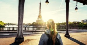 Traveler in Paris near Eiffel Tower