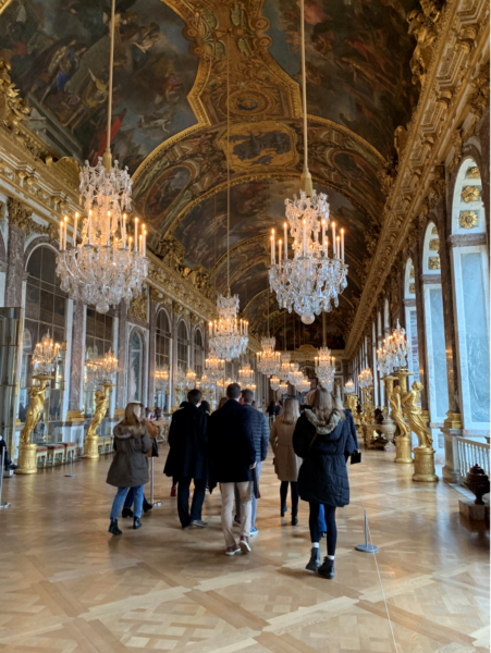 Following in royal footsteps in the Hall of Mirrors at the Palace of Versailles
