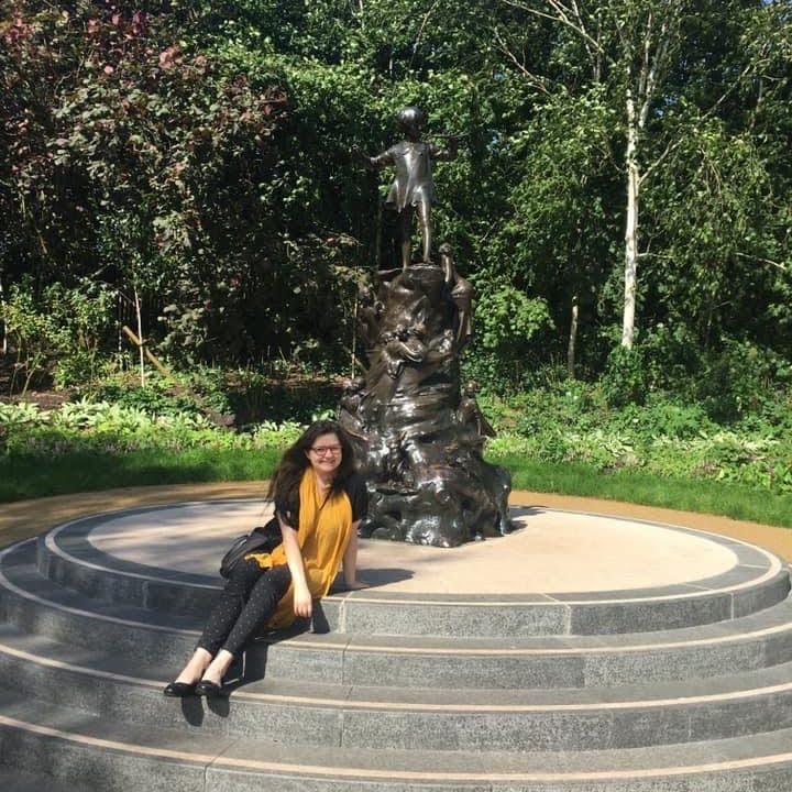 AIFS Study Abroad in London alum at Peter Pan statue 