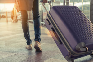 Traveler with suitcase