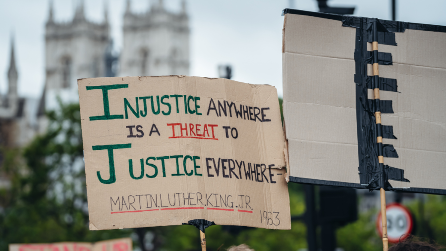Martin Luther King Jr. quote on a sign during a protest in London, England