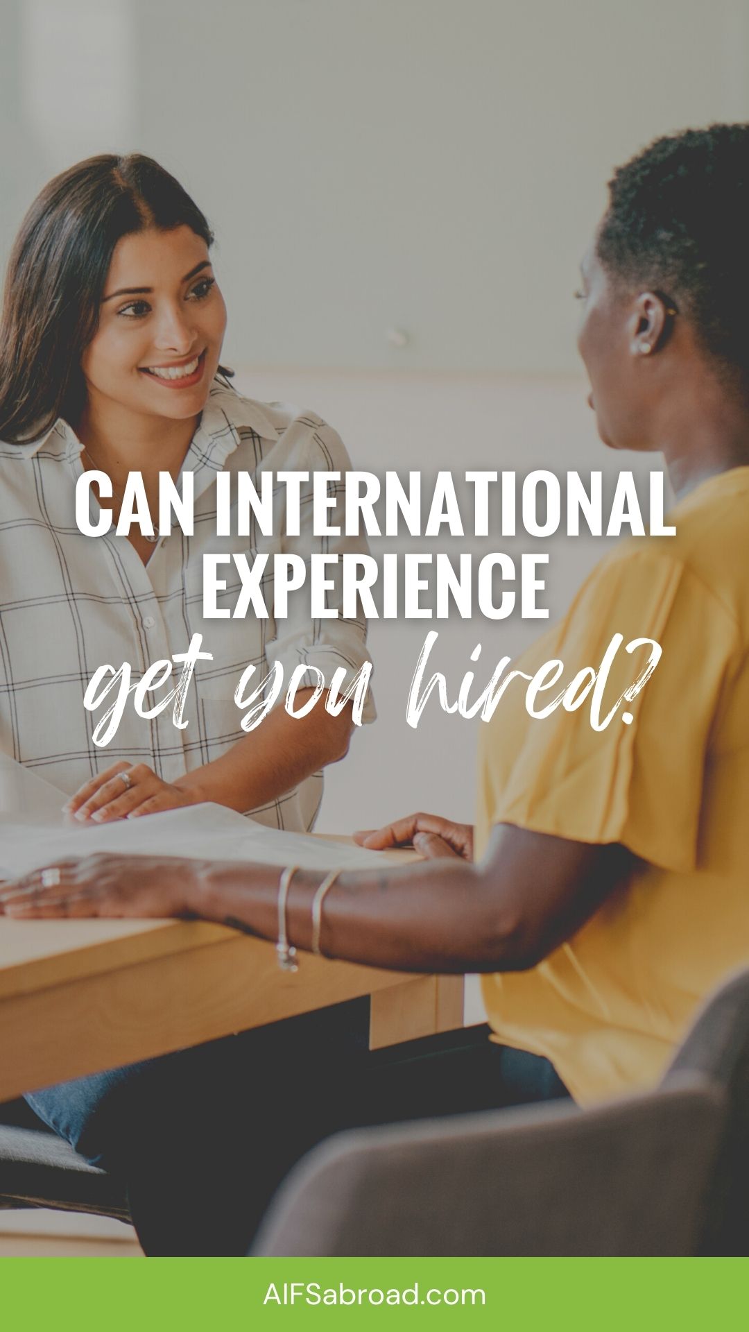 Can International Experience Get You Hired? Two professional women talking in an office