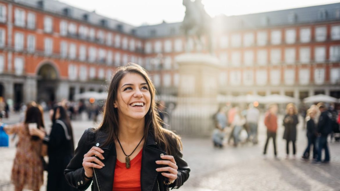 Student with backpack in Madrid, Spain