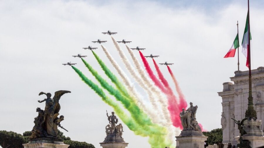 Airplanes in formation flying over Rome with colors of Italian flag in Rome, Italy for Festa della Repubblica