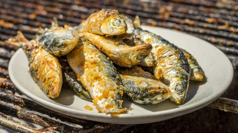 sardinhas assadas, a traditional fish dish in Portugal