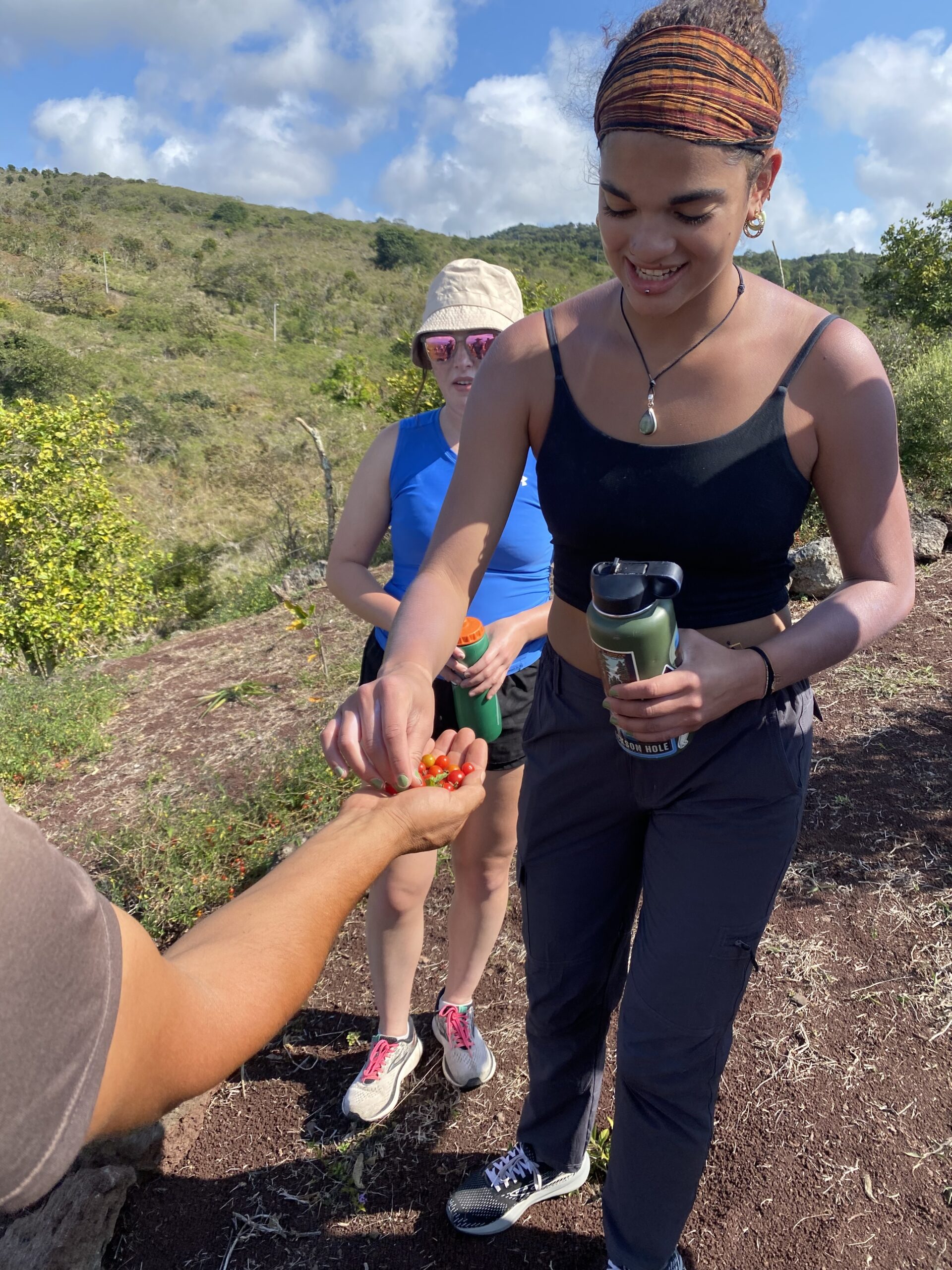 AIFS Abroad students visiting a sustainable and organic farm in Galápagos Islands, Ecuador for program's environmental Green Initiative while studying abroad