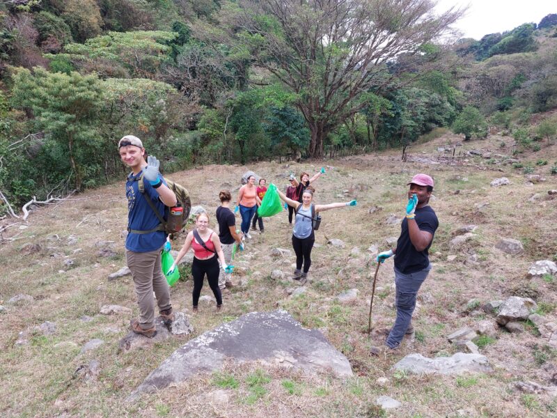 AIFS Abroad students doing a hiking clean up in San José, Costa Rica area for program's environmental Green Initiative while studying abroad