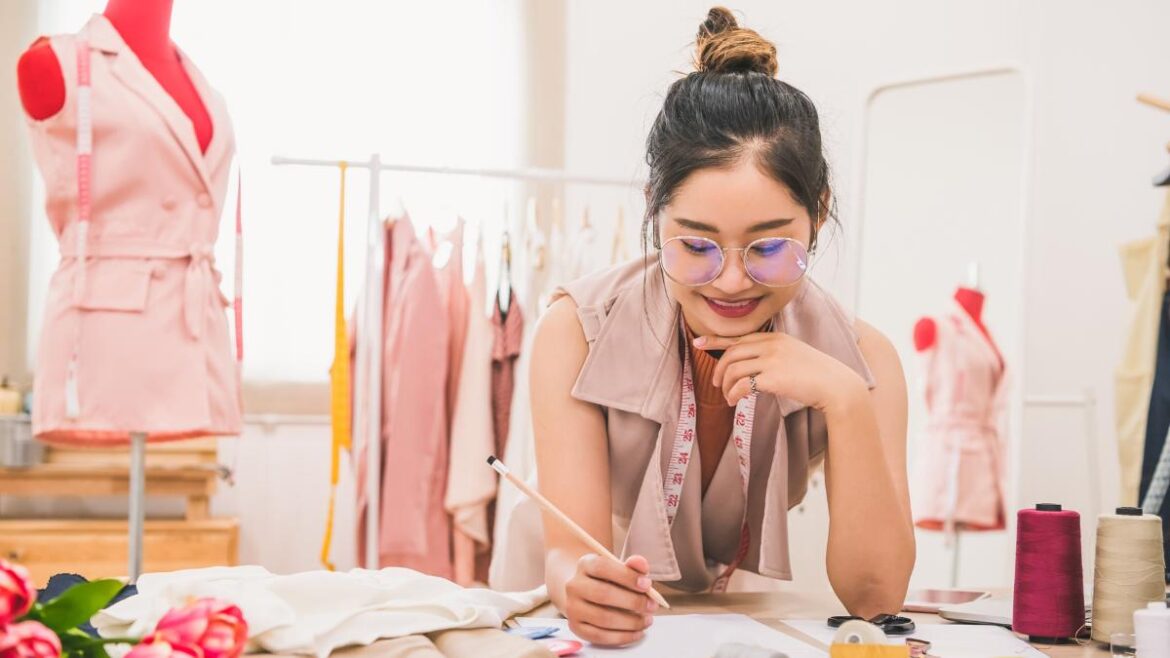 Young woman working on fashion project