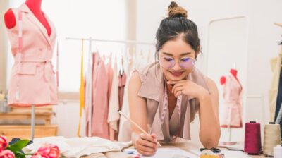 Young woman working on fashion project