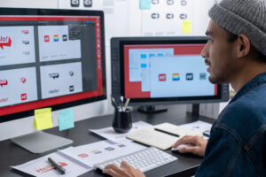 graphic designer working on computer drawing sketches logo design. The concept of a new brand. Professional creative occupation with idea.