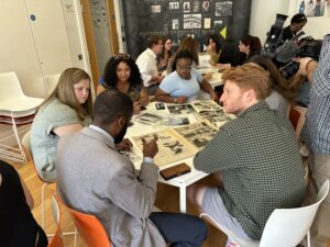 Explore First Research, students at table