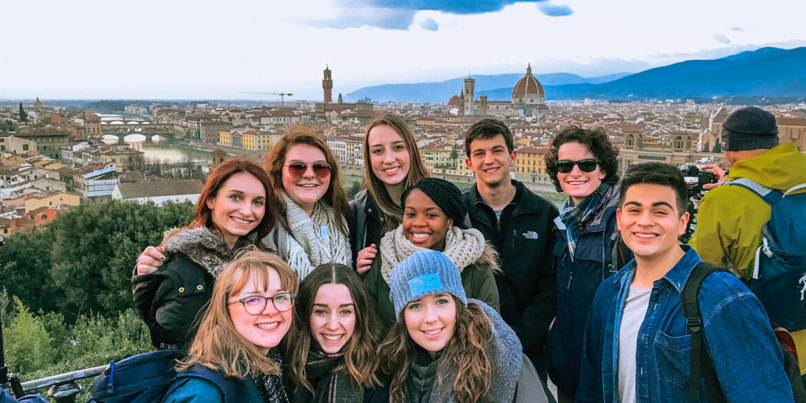group of happy study abroad students in florence, italy