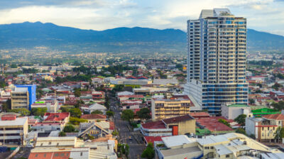 San Jose Costa rica capital city street view with mountains in the back