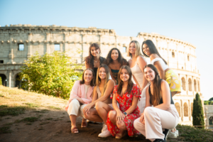 Group of students abroad in Rome, Italy near the Colosseum